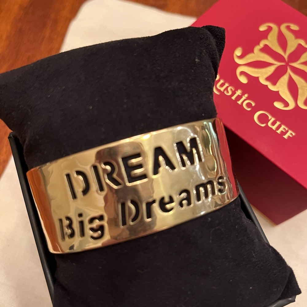 Authentic Rustic Cuff gold cuff with DREAM BIG DREAMS. Worn in great condition.